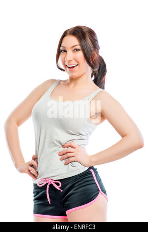 athlete in a gray T-shirt and shorts on a white background Stock Photo