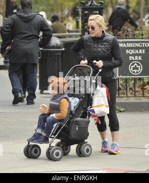 Jane Krakowski and her son Bennett out for a stroll near Washington Square Park  Featuring: Jane Krakowski,Bennett Robert Godley Where: New York City, New York, United States When: 05 Nov 2014 Stock Photo