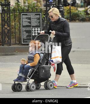 Jane Krakowski and her son Bennett out for a stroll near Washington Square Park  Featuring: Jane Krakowski,Bennett Robert Godley Where: New York City, New York, United States When: 05 Nov 2014 Stock Photo