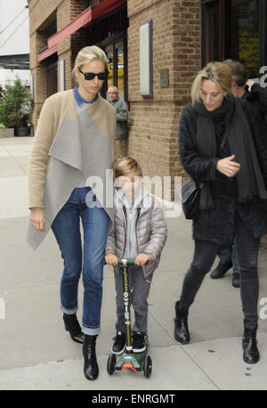 Karolina Kurkova takes a walk in Tribeca with her son Tobin on his micro-scooter  Featuring: Karolina Kurkova,Tobin Drury Where: Manhattan, New York, United States When: 05 Nov 2014 Stock Photo