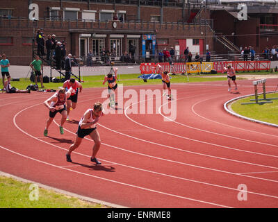 Runners set off on an 800M race at the Mountbatten Centre, Portsmouth, Hampshire, England Stock Photo
