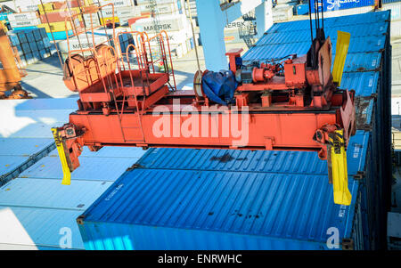 Industrial port crane lift up loading export containers box onboard at ...