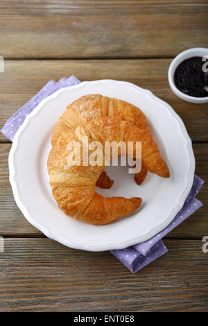 French croissant and jam, food closeup Stock Photo