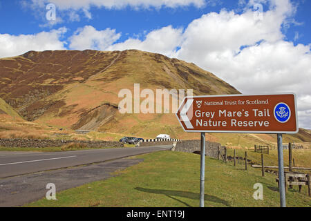 Sign and route to the Grey Mare's Tail Waterfall and Nature Reserve near Moffat in Southern Scotland. Stock Photo