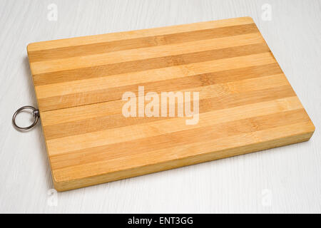 Cutting board, on the kitchen table, old Stock Photo