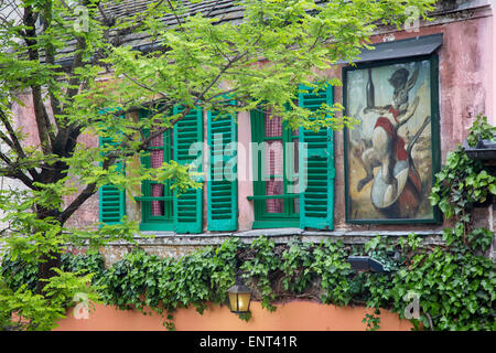 Au Lapin Agile, a tiny cabaret frequented by Picasso, Hemingway and other artists in early 1900's, Montmartre, Paris France Stock Photo