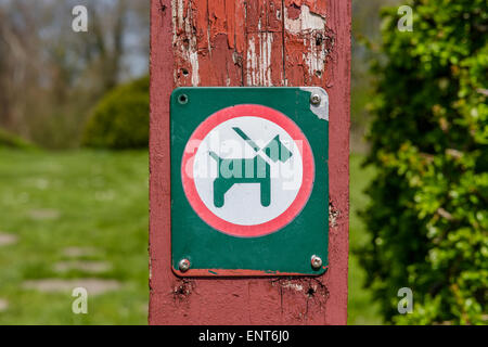 Warning sign with a dog in a leash Stock Photo