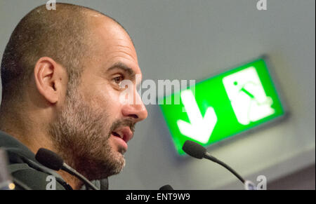 Munich, Germany. 11th May, 2015. FC Bayern Munich's head coach Pep Guardiola speaks during a press conference at Allianz Arena in Munich, Germany, 11 May 2015. FC Bayern Munich will meet FC Barcelona in the second leg semi final of the Champions League on 12 May. Credit:  dpa picture alliance/Alamy Live News Stock Photo