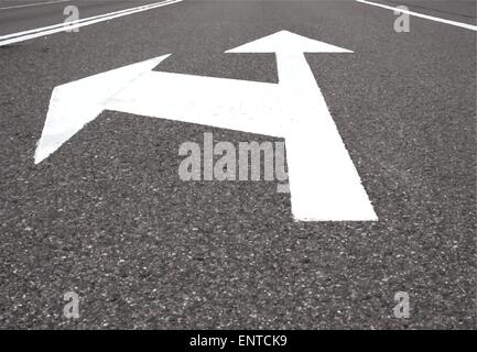 White arrow show left and straight on black asphalt road. Stock Vector