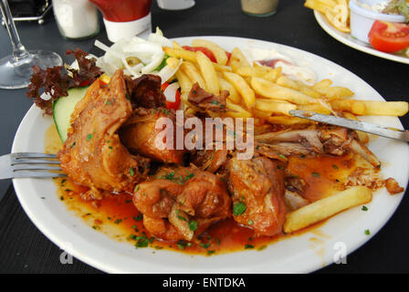 rabbit with chips, a local tradition,  Sliema  Malta Europe Stock Photo