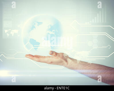 hand holding virtual sphere globe Stock Photo
