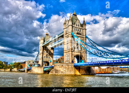 Tower Bridge, famous combined bascule and suspension bridge which crosses River Thames. London, United Kingdom. HDR. Stock Photo