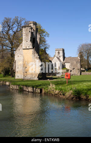 Ruins of Minster Lovell Hall (built in the 1440's) on the River Windrush, Minster Lovell, near Witney, Cotswolds, Oxfordshire, E Stock Photo