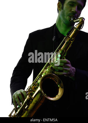 one caucasian man  saxophonist playing saxophone player in studio silhouette isolated on white background Stock Photo