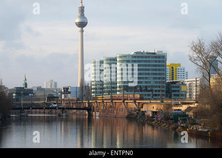 Spree river view in central Berlin with moving train and TV tower Stock Photo