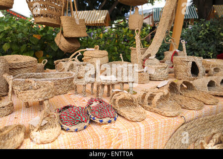 Several products made of Esparto, halfah grass, or esparto grass outdoor market,  Coin, Andalusia, Spain. Stock Photo