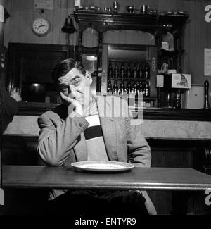 Sausage eating champion: Joe Steele of Bedlington Northumberland champion raw sausage eating champion. Circa 1965. Stock Photo