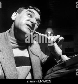 Sausage eating champion: Joe Steele of Bedlington Northumberland champion raw sausage eating champion. Circa 1965. Stock Photo