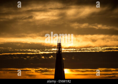 London, UK. 11th May, 2015. UK Weather: Sunset behind The Shard Building Credit:  Guy Corbishley/Alamy Live News Stock Photo