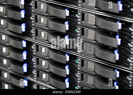 SAN storage hard drives in large datacenter Stock Photo