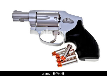Modern titanium revolver with five .38 cartridges isolated on white background Stock Photo