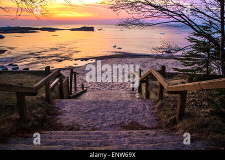Stairs leading to a beautiful Lake Superior sunset beach at the Hurricane River Campground in Pictured Rocks National Lakeshore. Stock Photo