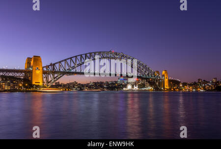 Sydney Harbour Bridge in Sydney Harbour, Sydney, New South Wales, Australia at sunset Stock Photo