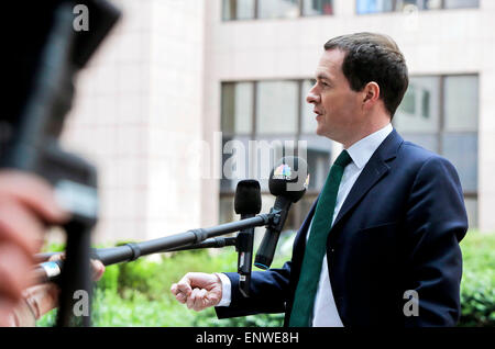 Brussels, Belgium. 12th May, 2015. Britain's Chancellor of the Exchequer George Osborne speaks to press as he arrives to attend an European Union (EU) finance minsters' meeting at the EU headquarters in Brussels, Belgium, May 12, 2015. Credit:  Zhou Lei/Xinhua/Alamy Live News Stock Photo