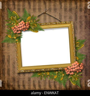 Picture gold frame with a decorative pattern and bunch Stock Photo