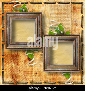 Grunge frames on the ancient wooden background Stock Photo