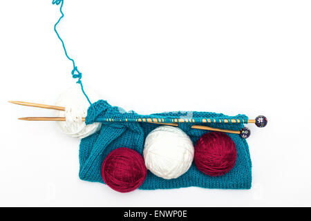 colorful yarn, knitted fabric and knitting spokes Stock Photo