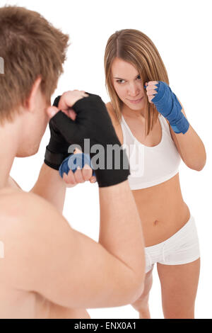Boxing - Young woman in class training on white Stock Photo