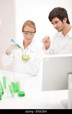 Genetic engineering - scientists in laboratory Stock Photo