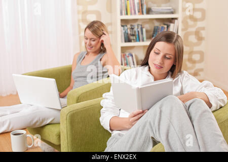 Students - Two female students studying in lounge Stock Photo