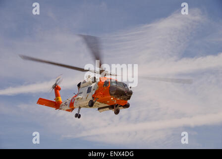 A U.S. Coast Guard HH-60J Jayhawk helicopter is aboard the amphibious ...