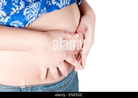 Pregnant woman hands in form of heart sign Stock Photo