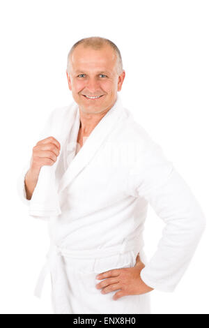 Male cosmetics - mature man in white bathrobe Stock Photo