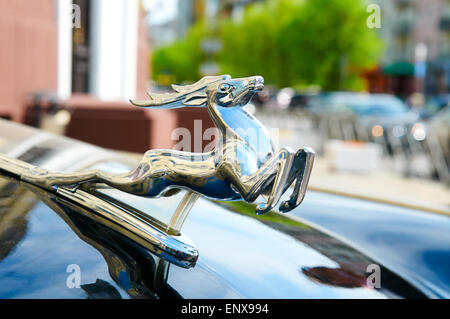 KALININGRAD, RUSSIA - MAY 9, 2015: Trademark DEER on the hood of the retro Soviet car GAZ-21 Volga Stock Photo