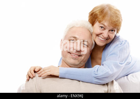 Happy spouses of advanced age on a white background Stock Photo