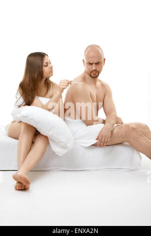 The woman shows result about pregnancy to the man Stock Photo