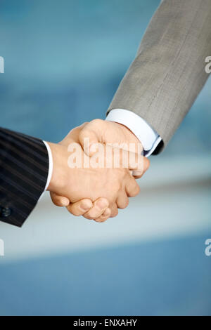 Close up of the businessmen shaking hands each other Stock Photo