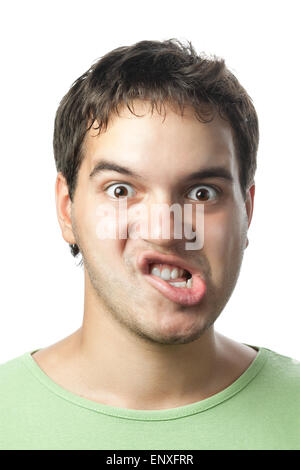 portrait of young grimacing man isolated on white Stock Photo