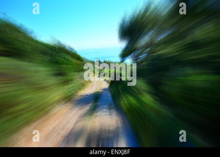 driving mountain bike on country road Stock Photo