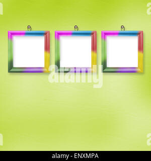 Multicolored bright frames hanging on the abstract pastel background ...