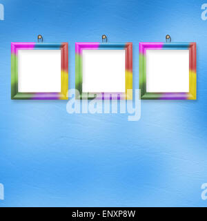 Multicolored bright frames hanging on the abstract pastel background ...