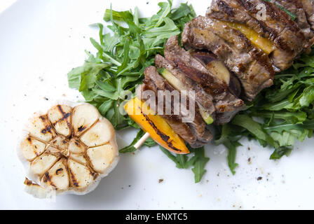 shashlik with potherbs on the plate shashlik with potherbs on the plate Stock Photo