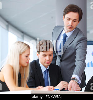 business people discussing financial report Stock Photo