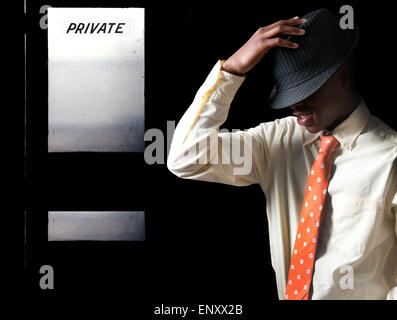 Black Teenage Man in Fedora Stock Photo