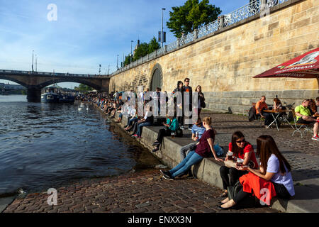 People relaxing at the waterfront, Naplavka Prague Czech Republic Stock Photo
