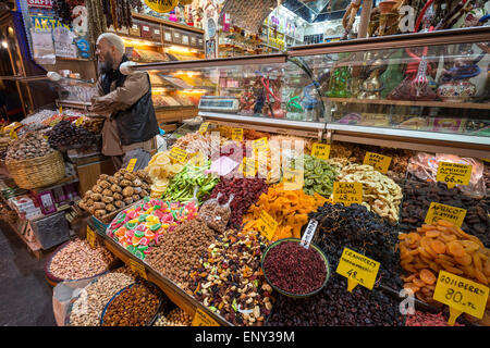 Nuts, dried fruits and spices on a stall at the spice bazaar, Eminonu, Istanbul, Turkey. Stock Photo